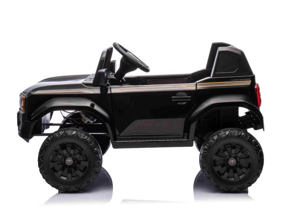 Mașinuță electrică Toyota Landcruiser 12V, negru, scaun lat, telecomandă 2.4 GHz, intrare USB / AUX, Bluetooth, suspensie, baterie litiu, lumini LED, motor 2 x 25W, licență ORIGINALĂ